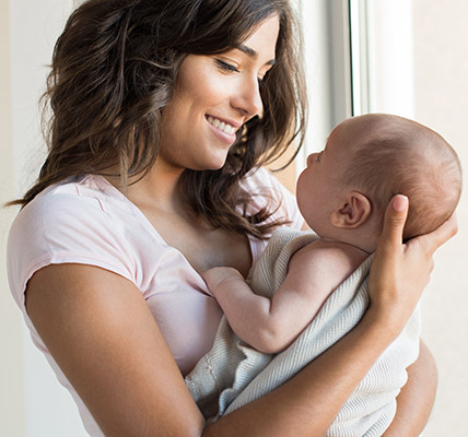 woman holding baby